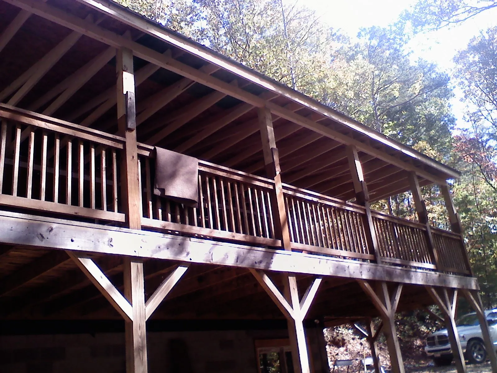 Timber framing under a new elevated porch and deck — Roof Leak Repair in Kerby by Roofing Brothers